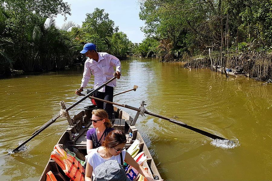 rowing boat in the Mekong Delta