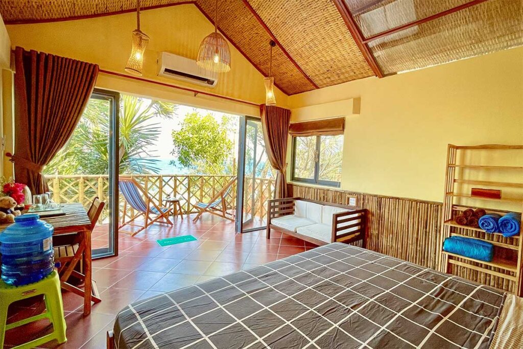 Life’s a Beach guesthouse near Bai Xep – Rustic bamboo bungalow with balcony seating, sea views, and laid-back décor for budget-minded travelers.