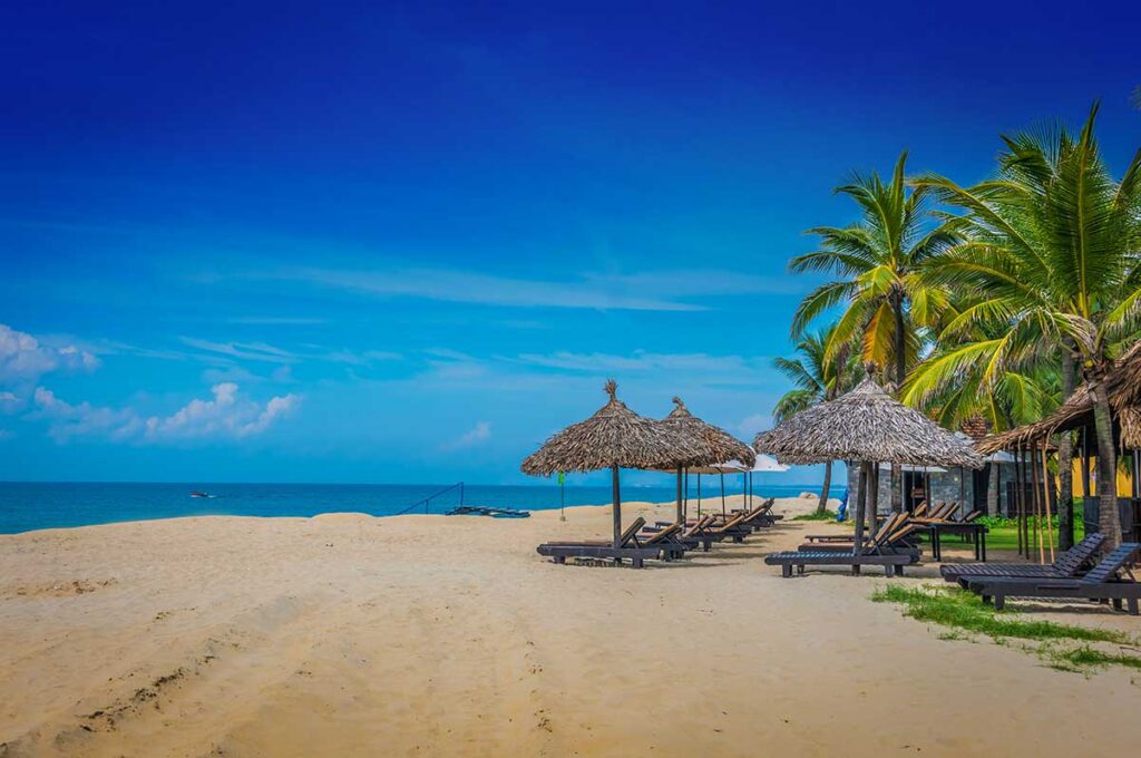Traditional round fishing boats on Cua Dai Beach, among the best beaches in Hoi An, Vietnam.