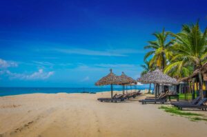 Traditional round fishing boats on Cua Dai Beach, among the best beaches in Hoi An, Vietnam.