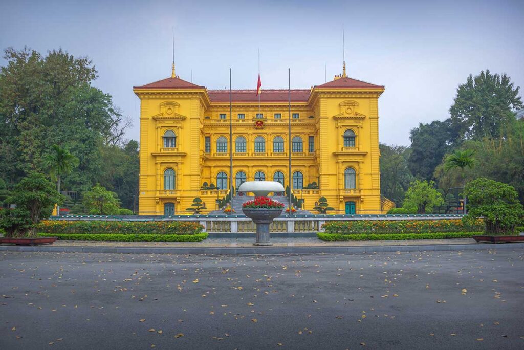 The front of the Presidential Palace in Hanoi with yellow walls