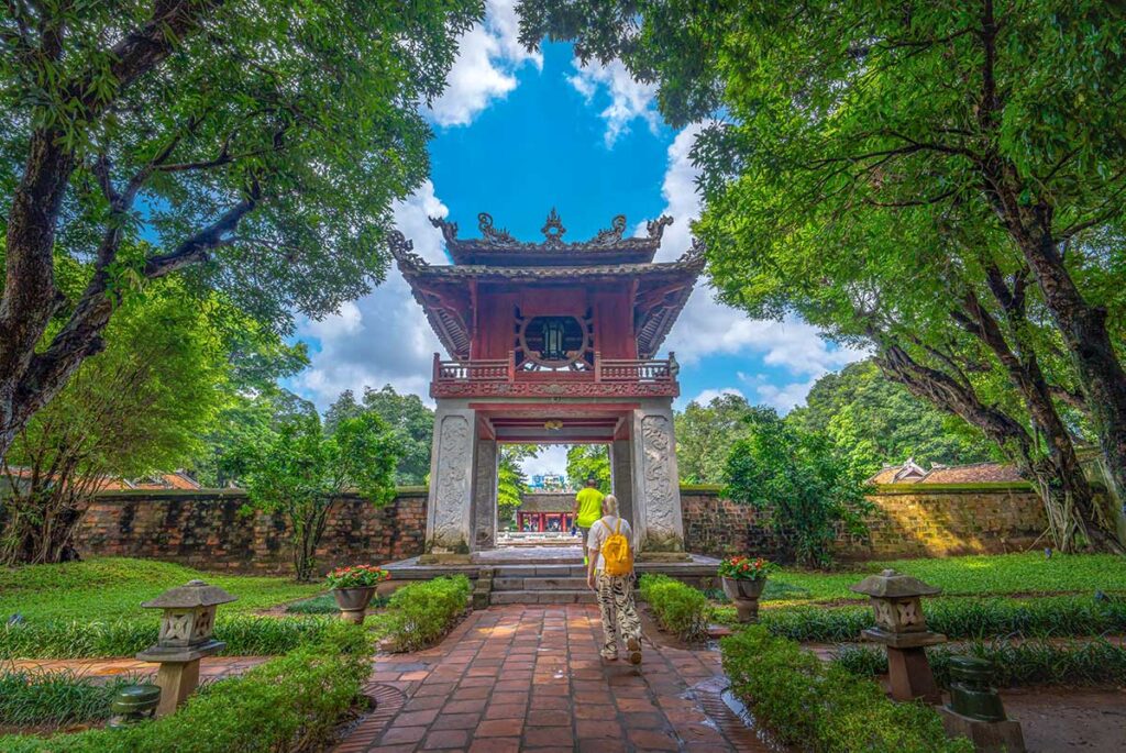 Tourists walking through the Khue Van Pavilion