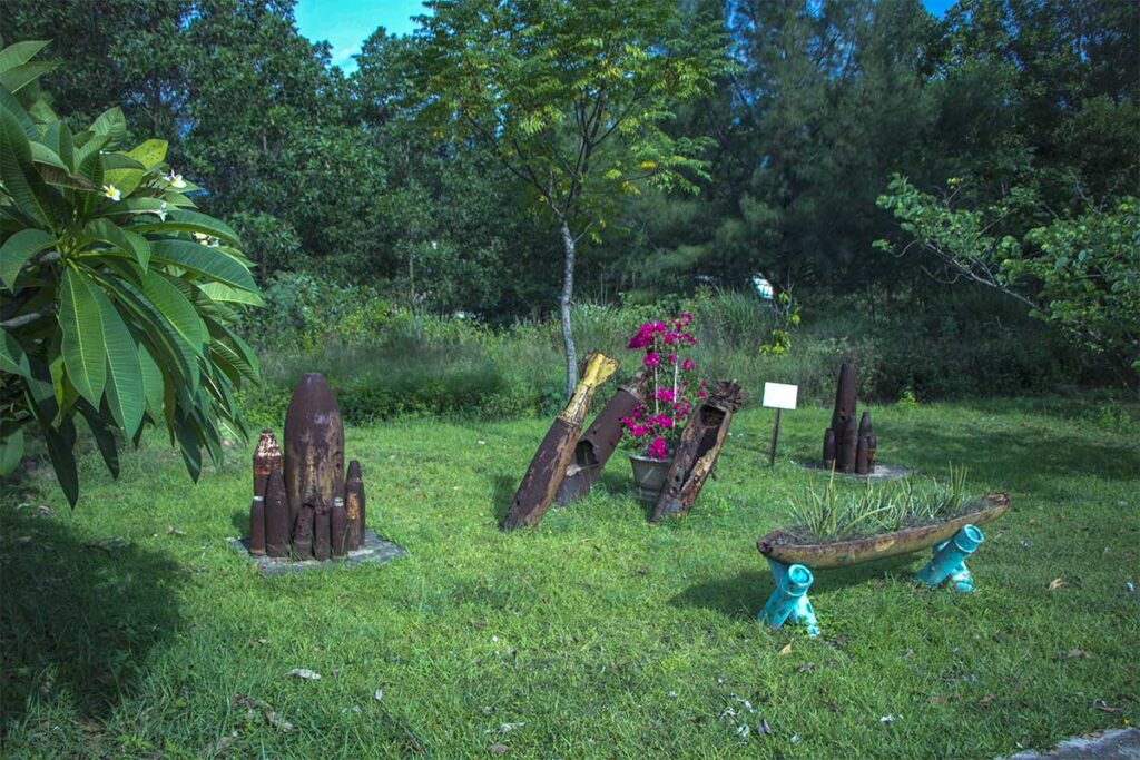 The garden outside Mine Action Visitor Center where bombs from Vietnam War are used as decoration items