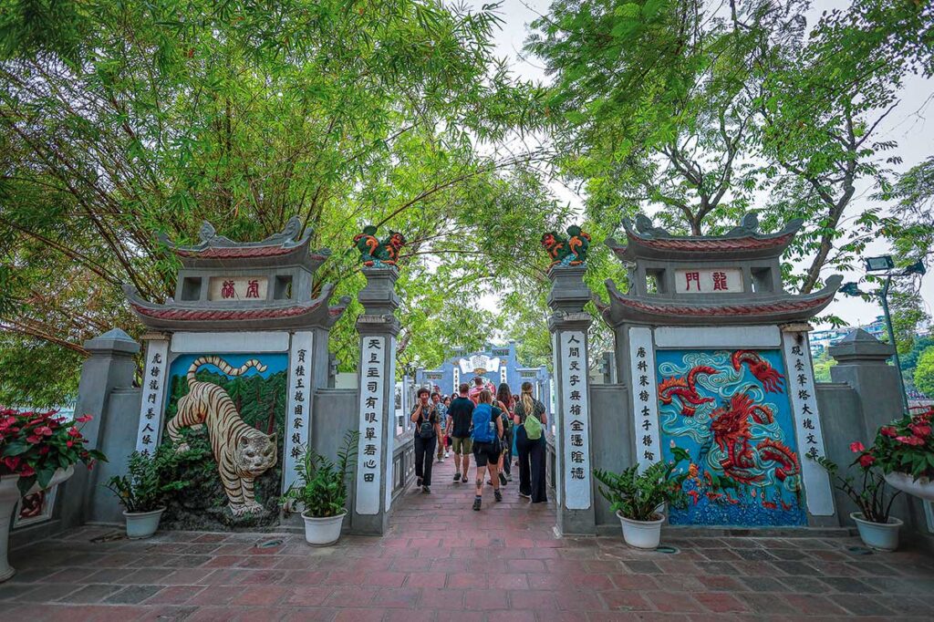 Dragon and tiger carvings at the entrance path to Ngoc Son Temple, Hanoi