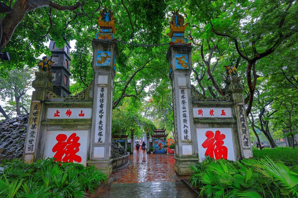 Nghi Mon Gate, main entrance to Ngoc Son Temple in Hanoi with dragon motifs