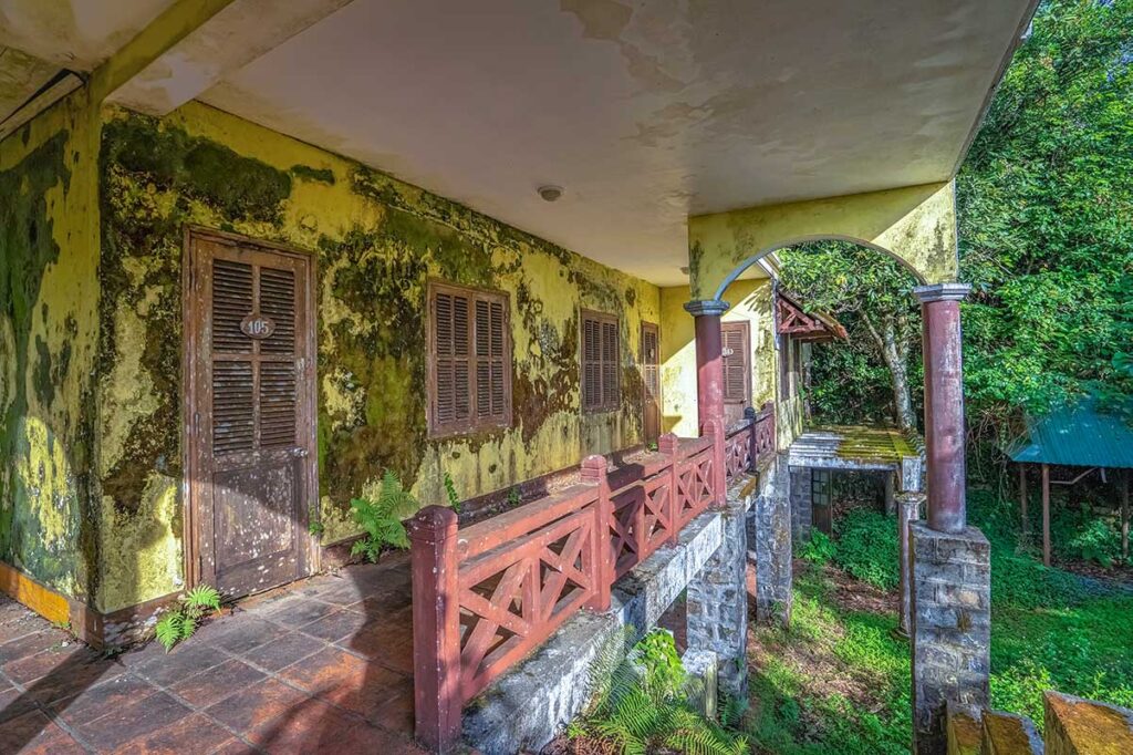 An old overgrown french village inside Bach Ma National Park