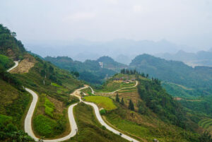View over mountains and road from Quan Ba ​​Heaven Gate in Ha Giang