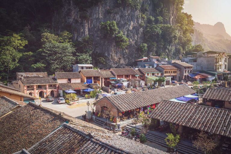 Bird's eye view of Dong Van Old Quarter, showcasing the tiled roofs of historic houses.