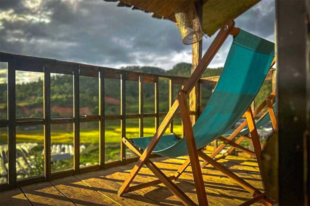 Balcony with chairs of a cabin of Ecolodge Mu Cang Chai