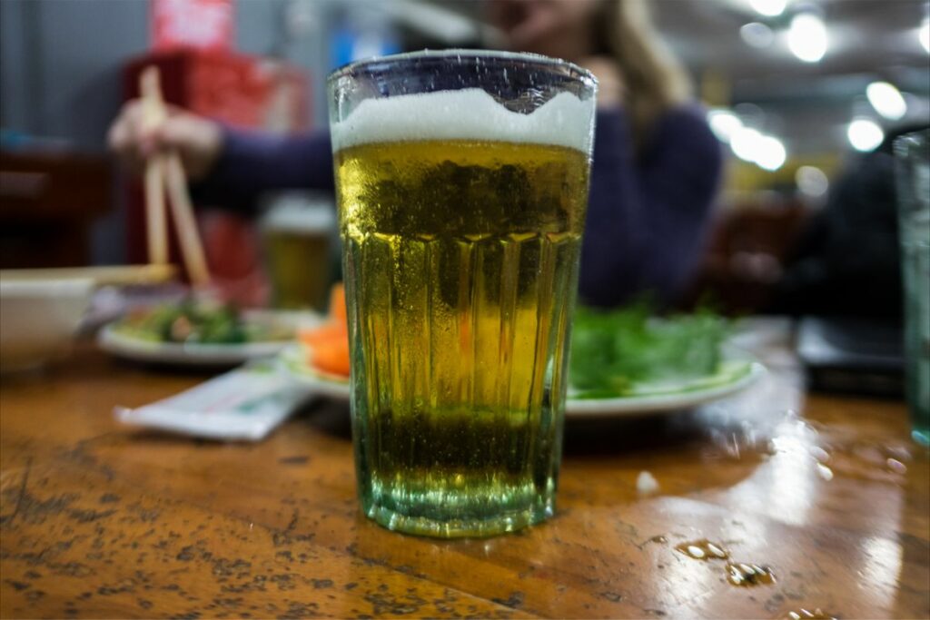 A glass of Bia Hoi beer