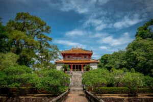 Stone path over water leading to one of the main halls of Minh Mang Tomb