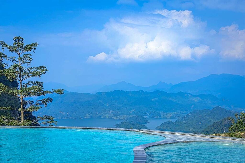 Pool high up the mountains at Ba Khan Village Resort with views over Hoa Binh Lake