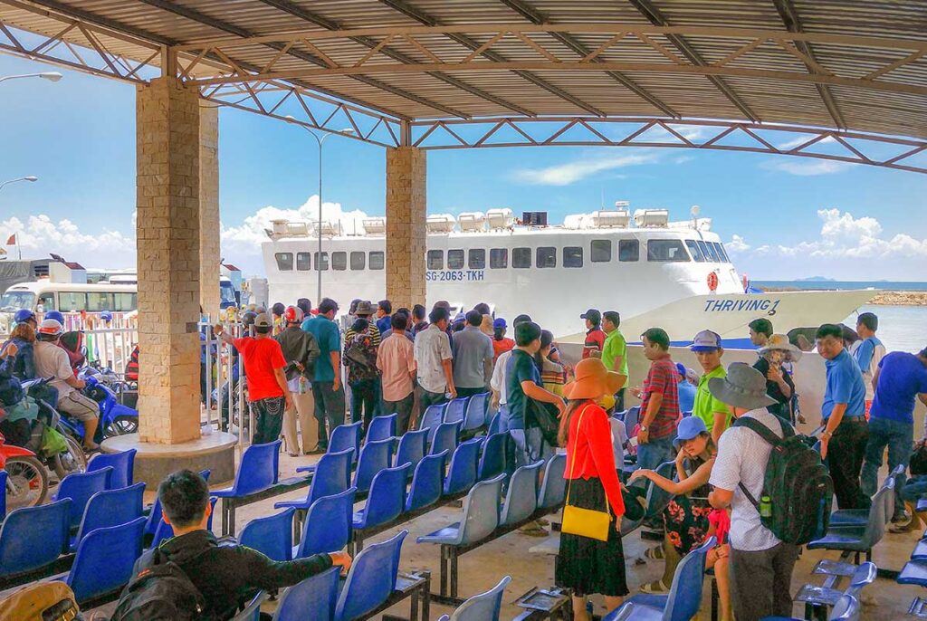 Passengers waiting at Ha Tien ferry port for the Phu Quoc boat.
