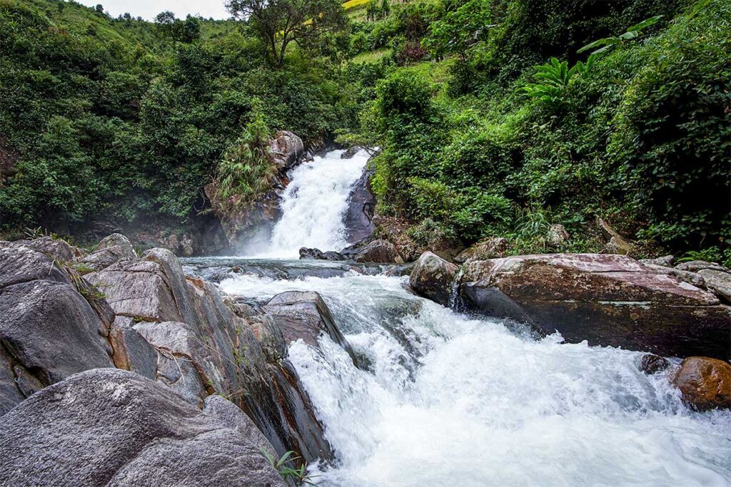 Mo Waterfall and steam in the forest in Mu Cang Chai