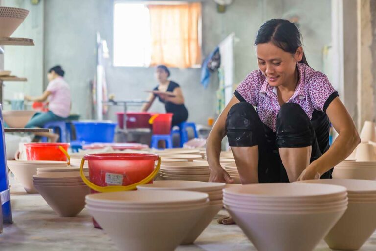making pottery in Bat Trang Ceramic Village