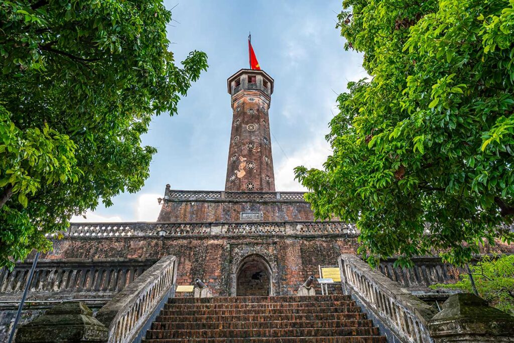 Hanoi Flag Tower: The historic Hanoi Flag Tower stands tall within the Imperial Citadel of Thang Long, flying the Vietnamese flag. (Imperial Citadel of Thang Long)