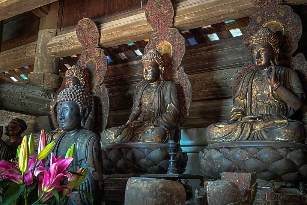 Tay Phuong Pagoda Statues: Ancient statues of deities and mythical figures adorn the interior of Tay Phuong Pagoda near Hanoi, a testament to Vietnam's rich cultural heritage.