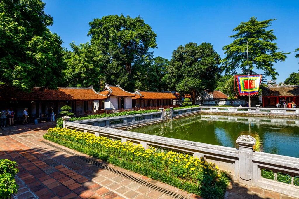 Temple of Literature Pond: A peaceful pond reflects the surrounding architecture at the Temple of Literature in Hanoi.