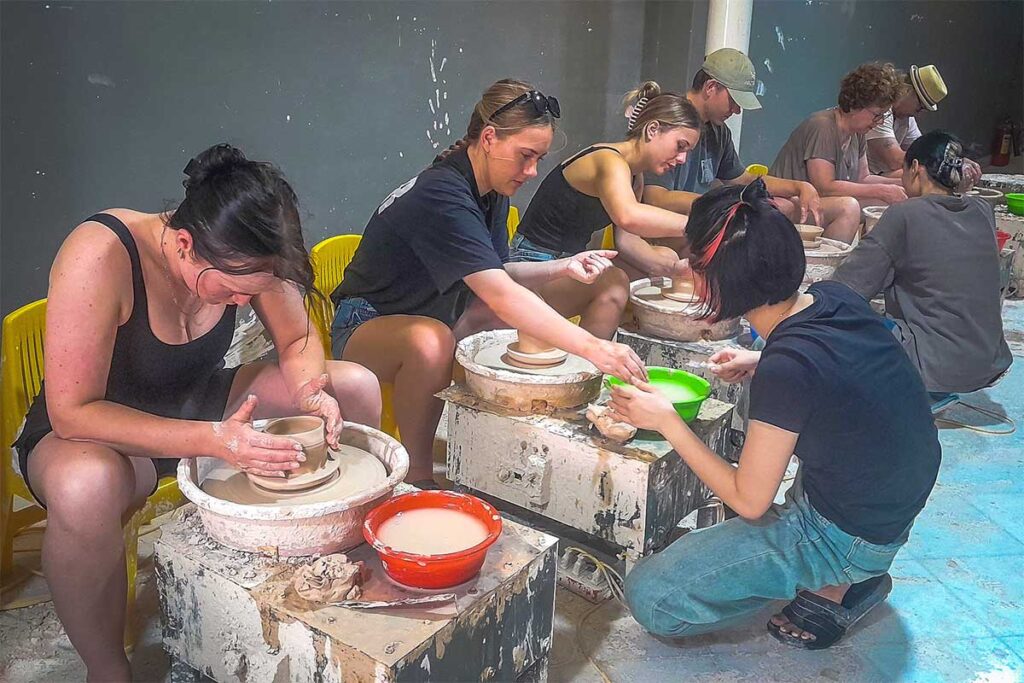 A group of tourists joining a pottery workshop in Bat Trang