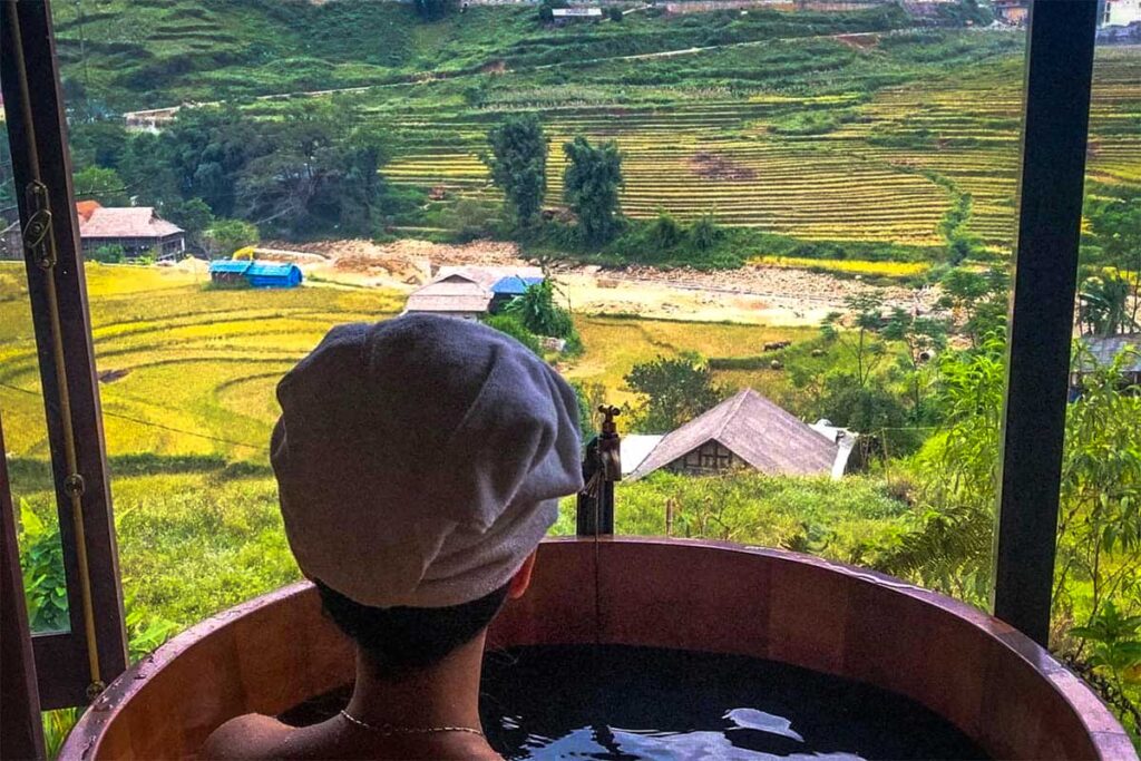 the view from a herbal bath on the rice fields inside En Hotel in Sapa