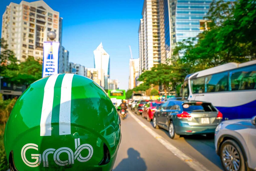 The view from behind on a Grab motorbike taxi in Hanoi