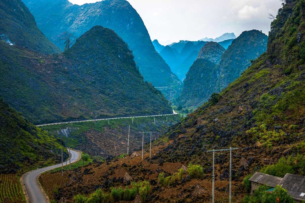 Stunning nature in Vietnam, a road, part of the Ha Giang Loop, passes through the most stunning mountain landscape in the country