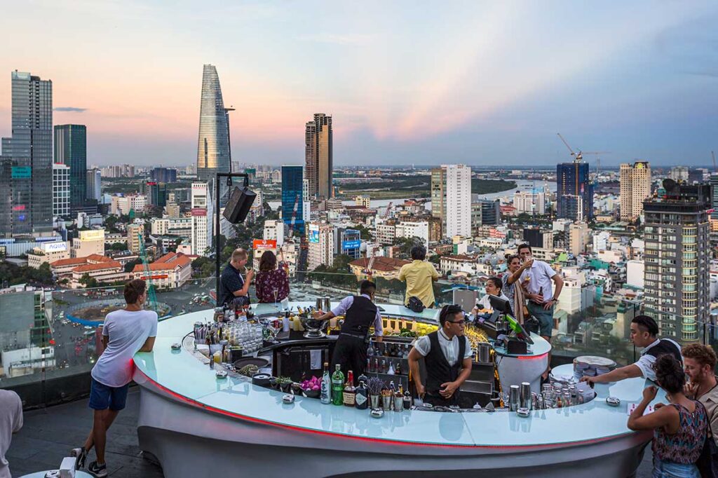 A high end rooftop bar overlooking the skyline of Ho Chi Minh City - A perfect place for a drink during a luxury holiday in Vietnam