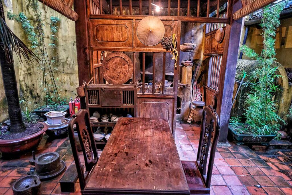 Tables, chairs and other furniture inside Ma May Ancient House in Hanoi