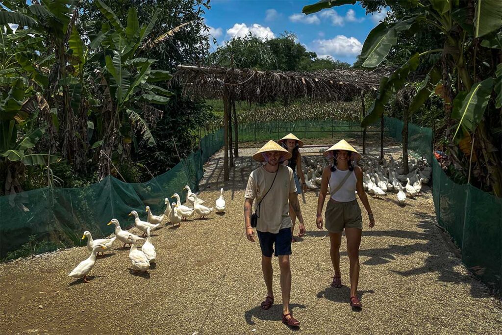 Two tourists walking at The Duck Stop 