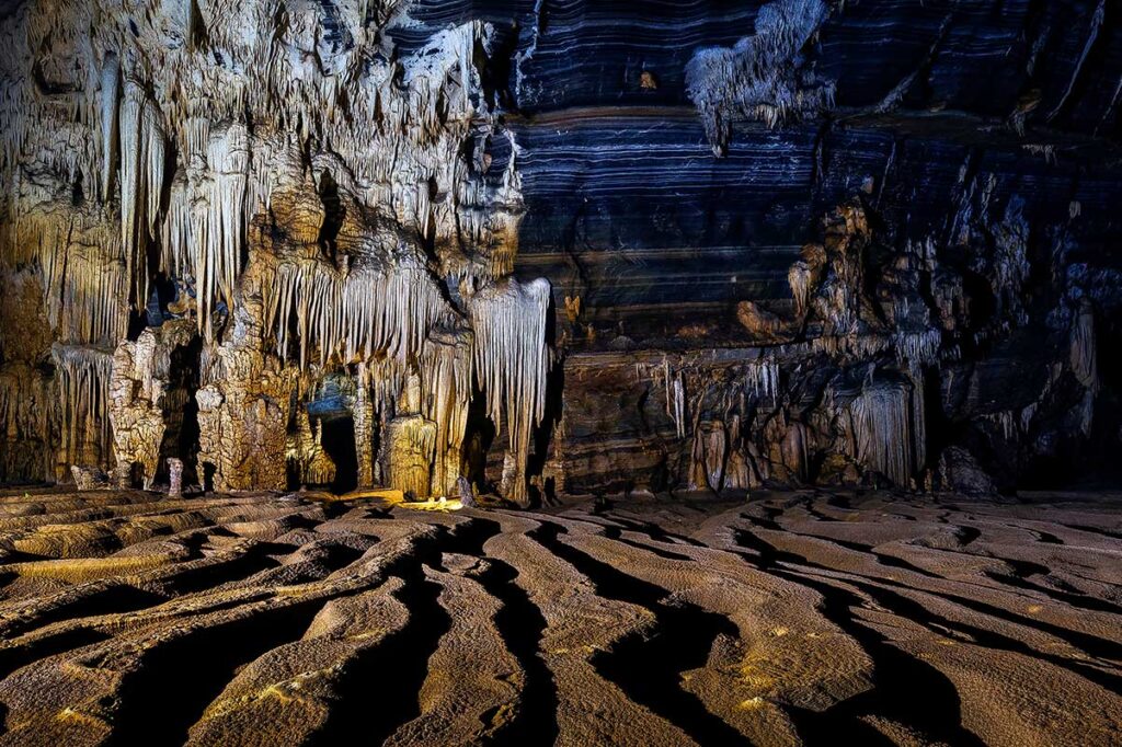 Stunning rock formations inside Tien Son Cave in Phong Nha National Park