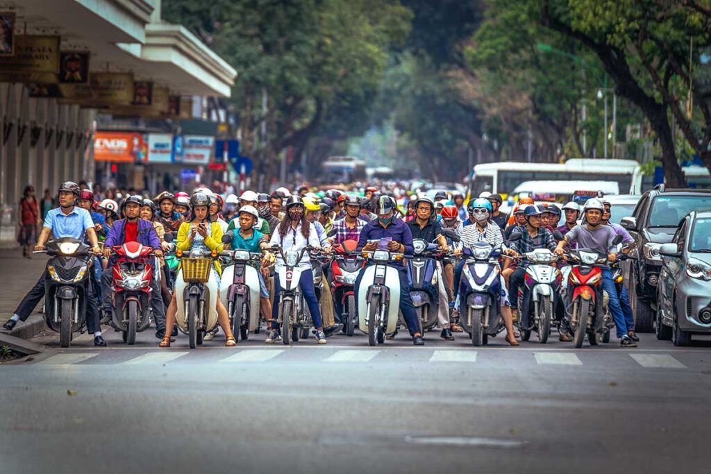 Busy traffic in Hanoi with motorbikes