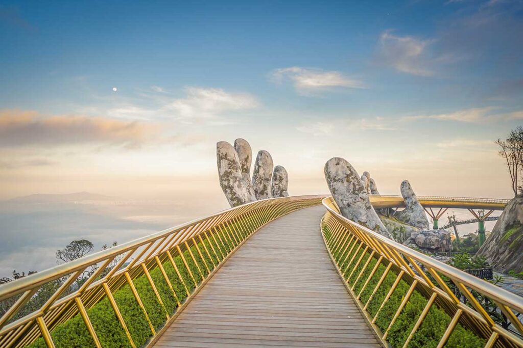 The Golden Bridge in Ba Na Hills near Da Nang – famous day trip from Hoi An featuring panoramic views and unique design.