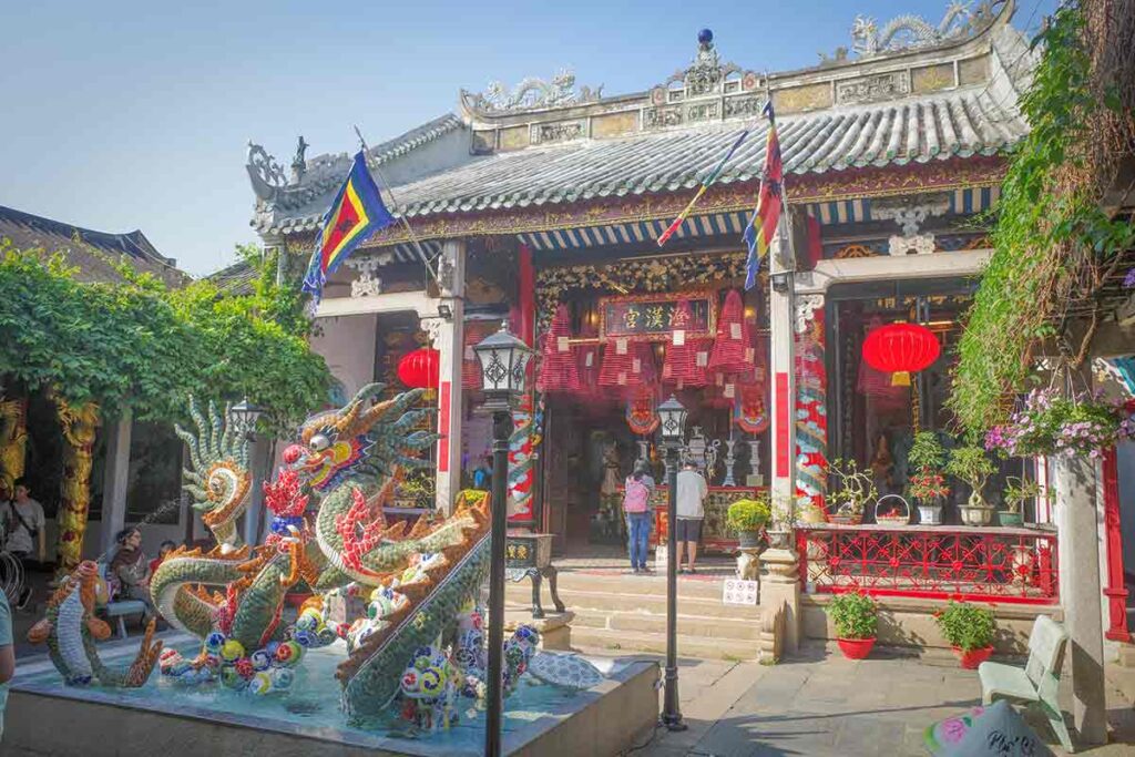 Ornate Chinese Assembly Hall with dragon statues in Hoi An – one of the most beautiful cultural sights to visit.