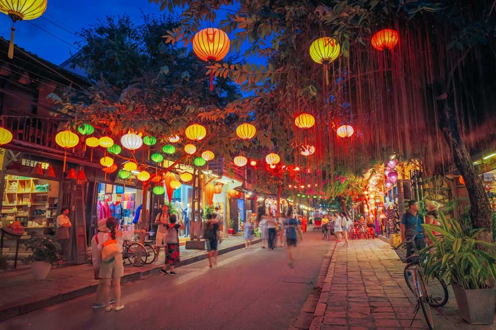 Colorful lanterns lighting up Hoi An Ancient Town at night – one of the most iconic things to do in Hoi An.