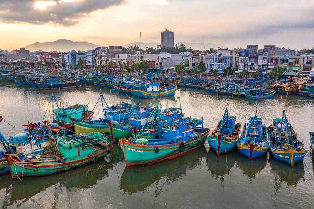 Many colourful fishing boats in the port of Vung Tau