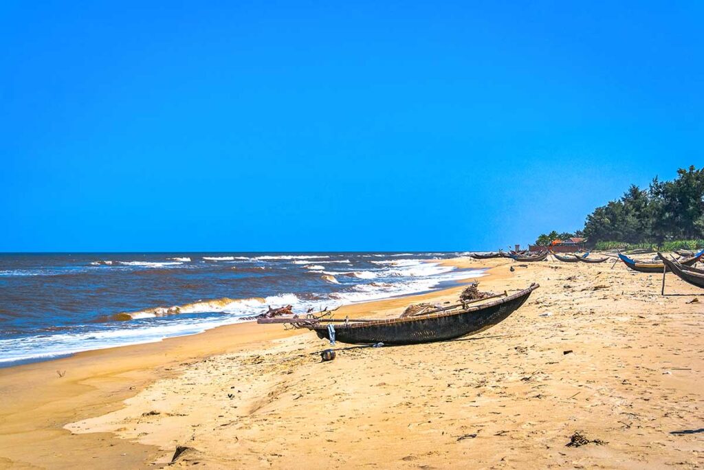 Small bamboo fishing boats on Hai Tien Beach in Thanh Hoa