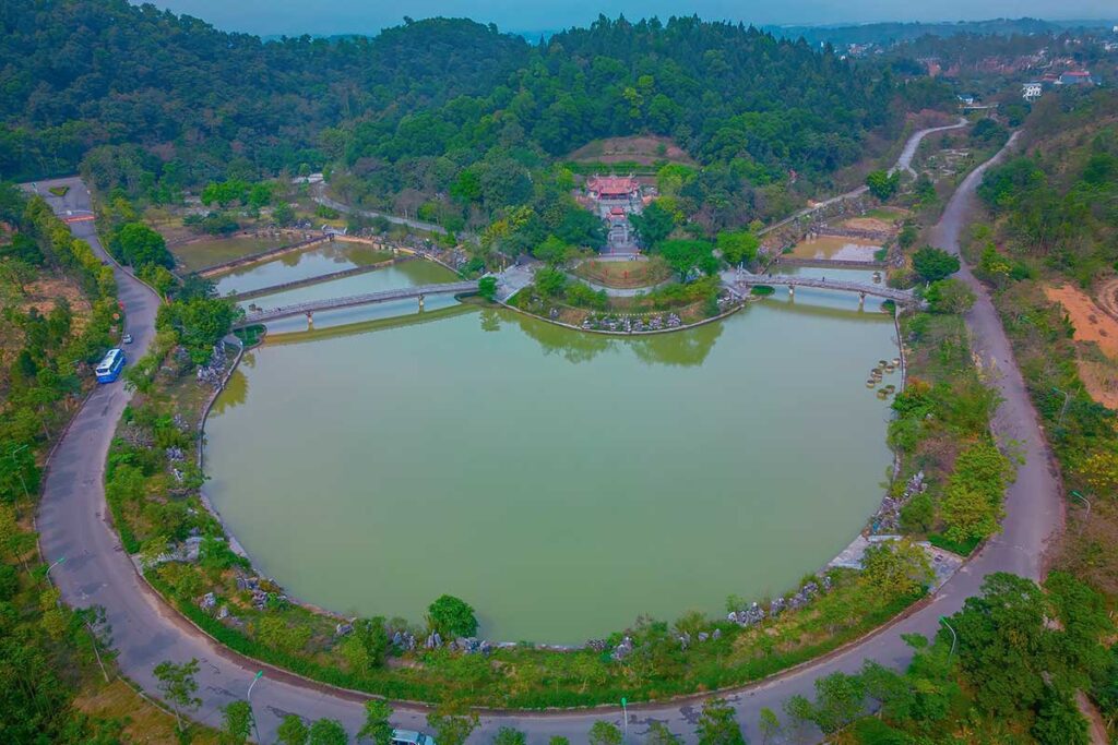 Aerial view of Lac Long Quan Temple with a lake in front of the temple