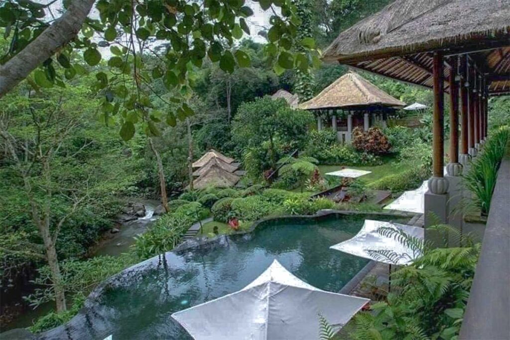 A swimming pool part of a small resort at My Lam