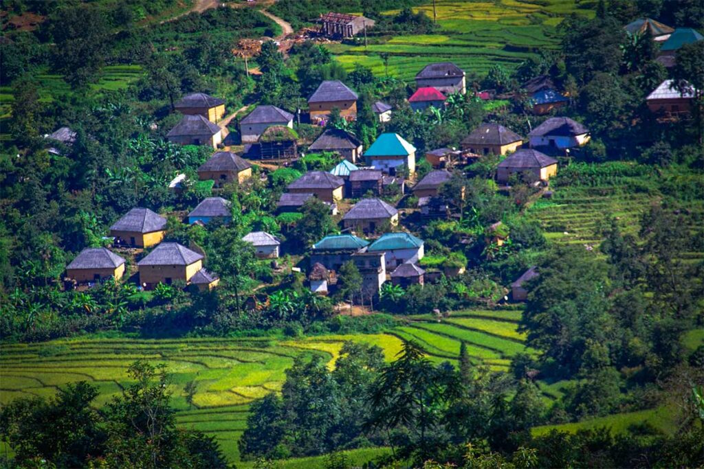Traditional ethnic houses of minorities inside a small local village in Y Ty Commune