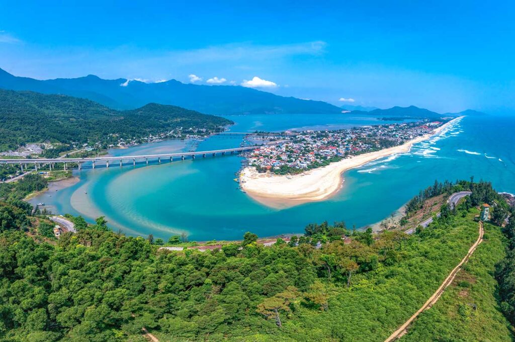 Best time to visit Hue - Clear blue sky above Lap An Lagoon and Lang Co Beach seen from the Hai Van Pass