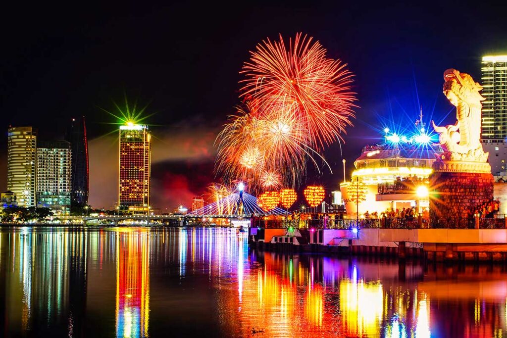 Crowds gathered along the waterfront promenade near the Carp-Dragon Statue, enjoying the Da Nang International Fireworks Festival.