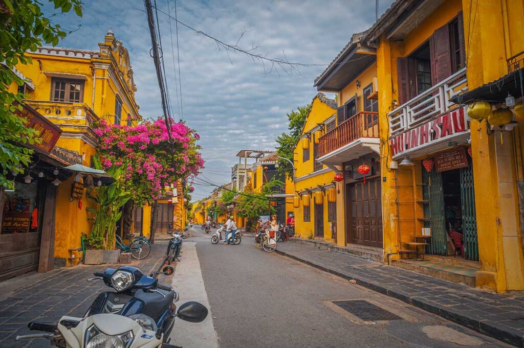 Early morning in Hoi An Ancient Town in September, when the streets are quieter and clouds often roll in after humid nights and short tropical showers.