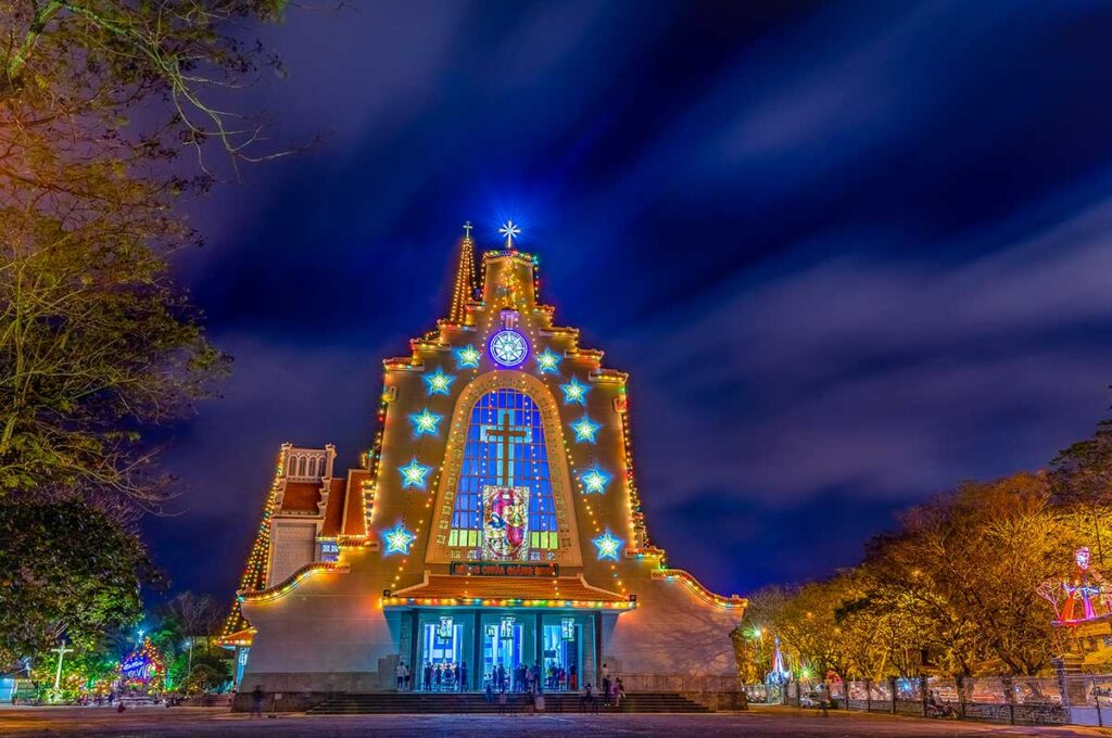 Hue in December - A church in Hue nicely decorated with lights at night for Christmas