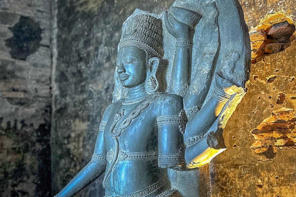 Cham Shiva statue inside the Kalan main tower at Banh It Cham Towers, Binh Dinh.