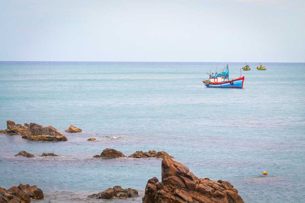 Scenic lookout over the rocky shoreline and turquoise water at Eo Gió, Quy Nhon