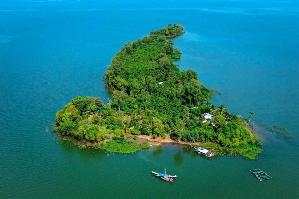 Aerial view of an island in Tri An Lake that is only reached by boat tour