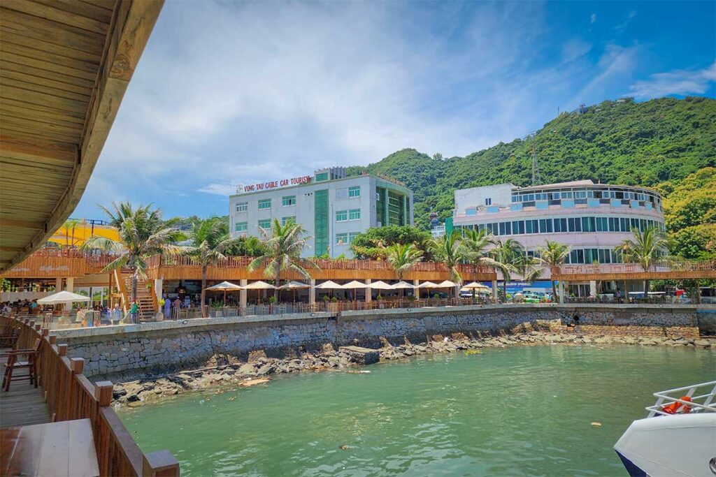 Vung Tau ferry terminal area with waterfront buildings, restaurants and departure point for boats to Con Dao