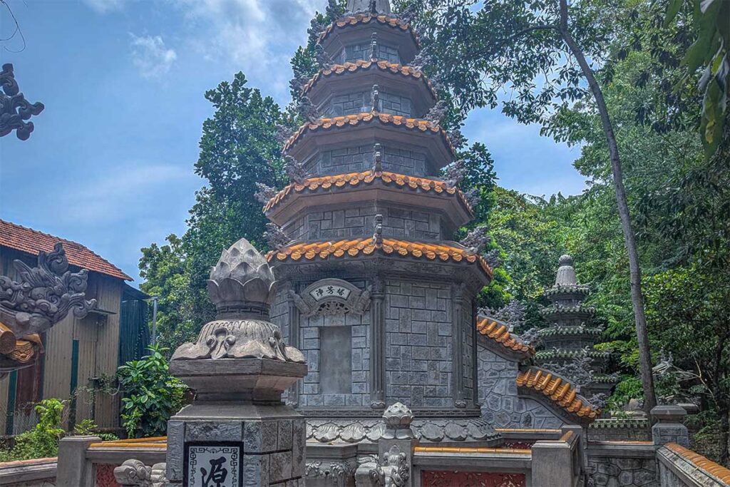 Different stupas in the outside garden area of Bao Quoc Temple in Hue
