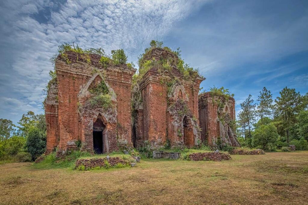 Detailed facade of a Cham tower with triangular arch at Chien Dan heritage site