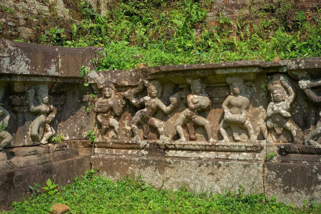 Cham stone relief carvings of dancers and musicians at Chien Dan Cham Towers